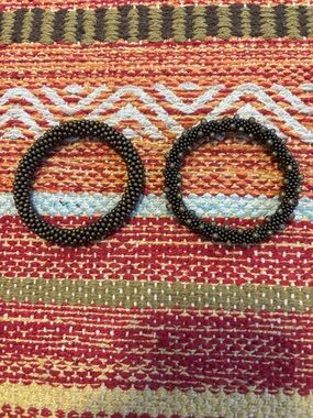 Two handmade crocheted beaded bracelets from OMBEADWORK.